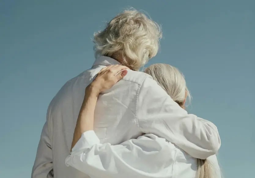Elder couple embracing
