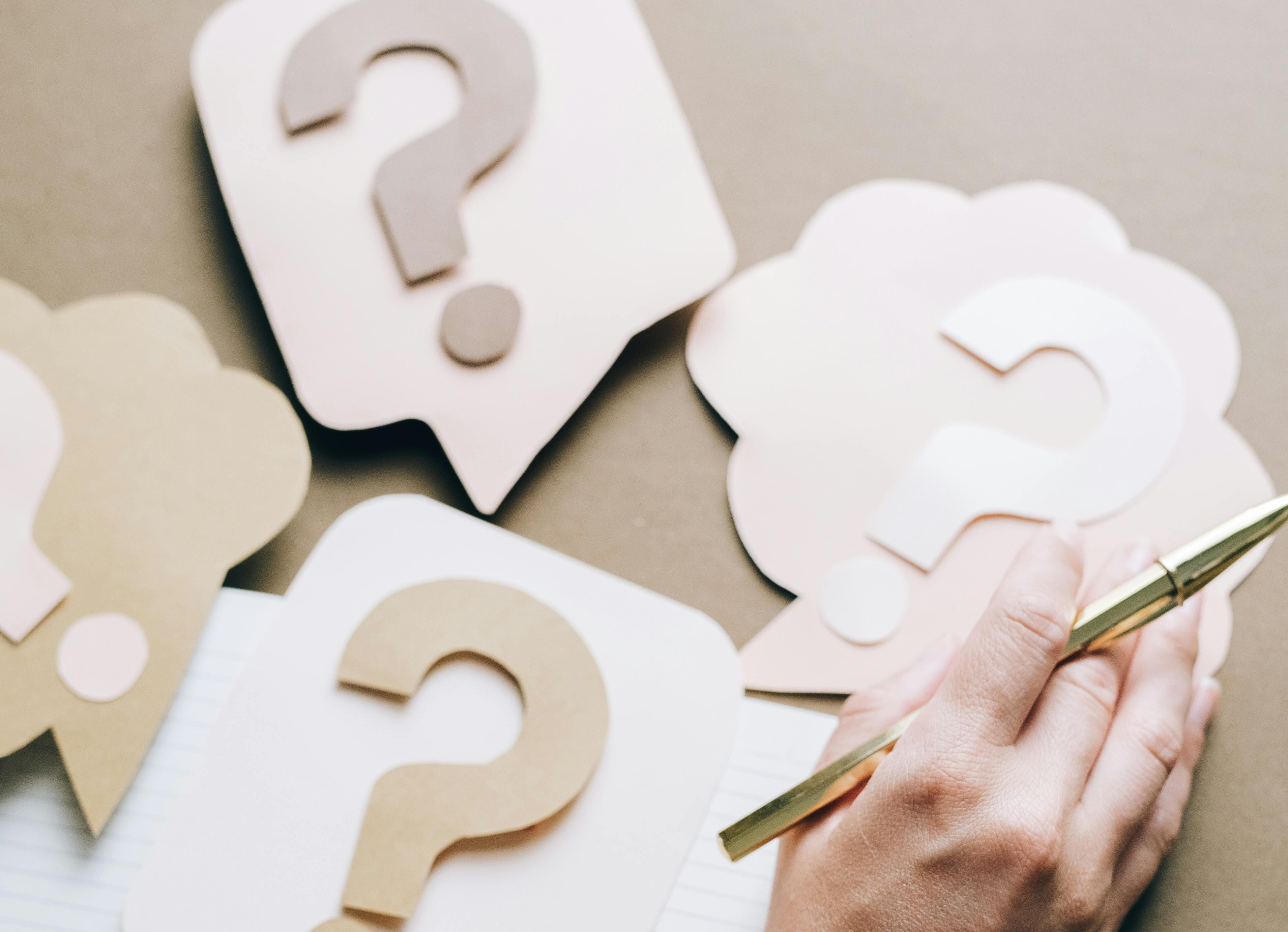 A person handing multiple questions