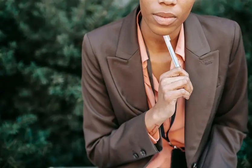 A woman sitting and thinking