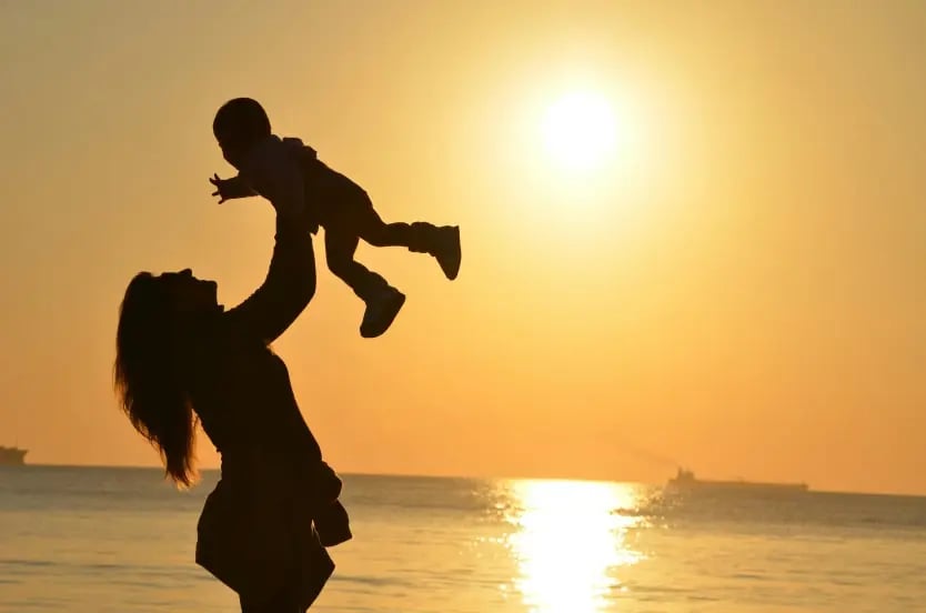 Mother and child at the beach