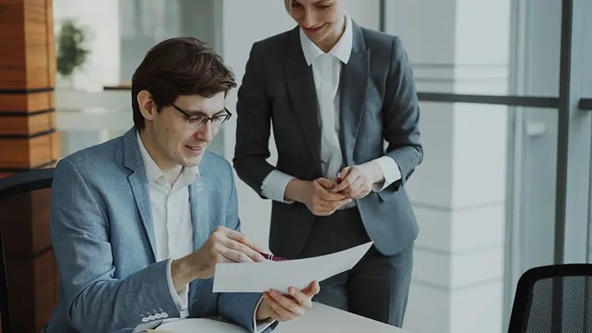 Business people reviewing documents