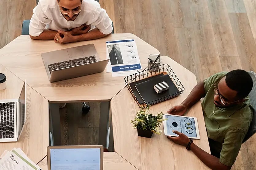 Workers in a meeting at table
